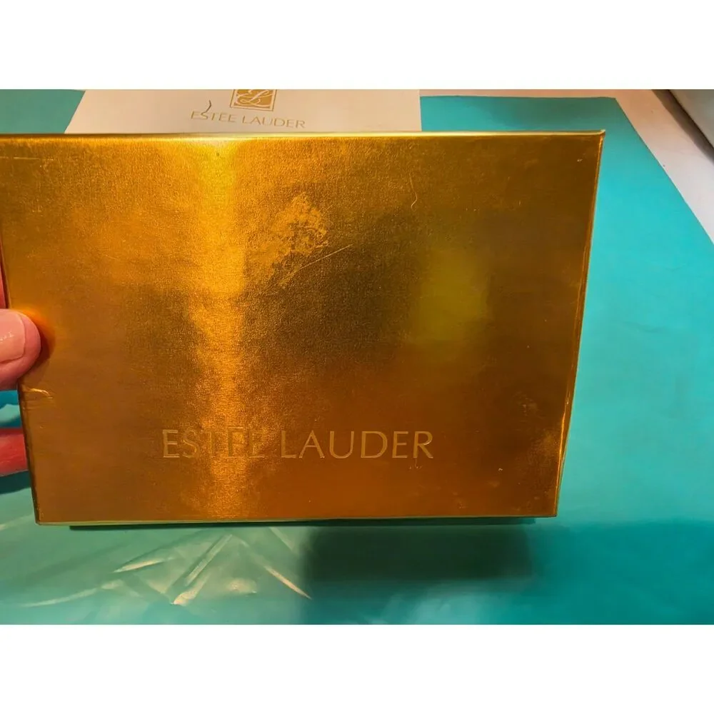 1990's Estee Lauder Lucidity Swirl of Gold 